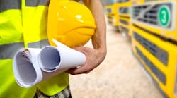 Construction worker with documents Construction worker with documents