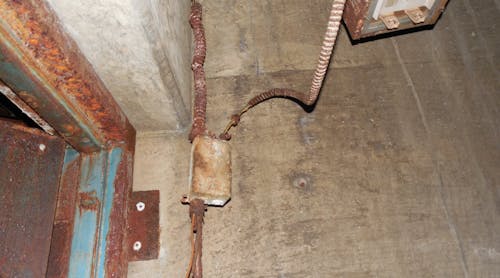 severely rusted raceways and electrical wiring