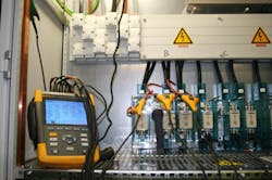 Photo 2. This photo is an example of a typical power quality analyzer setup. Photo 2. This photo is an example of a typical power quality analyzer setup.