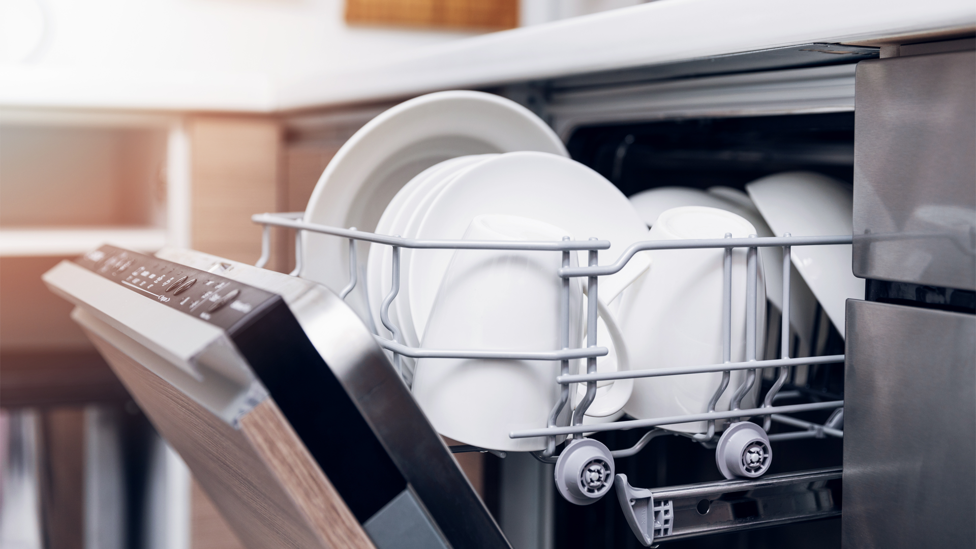 open dishwasher with dishes inside