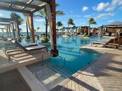 swimming pool at a resort swimming pool at a resort