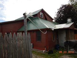 Airborne PVC conduit on back of restaurant Airborne PVC conduit on back of restaurant