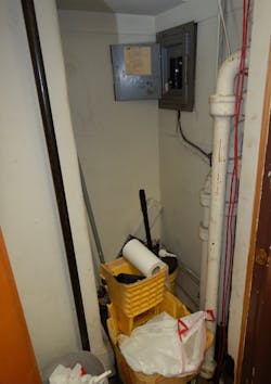 circuit breaker in cluttered janitor's closet circuit breaker in cluttered janitor's closet