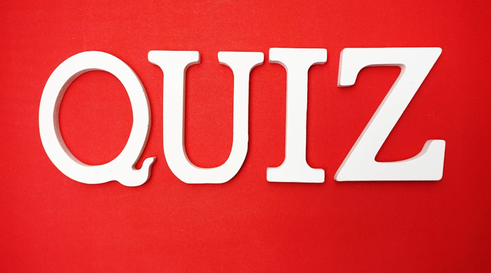 white quiz letters on red background