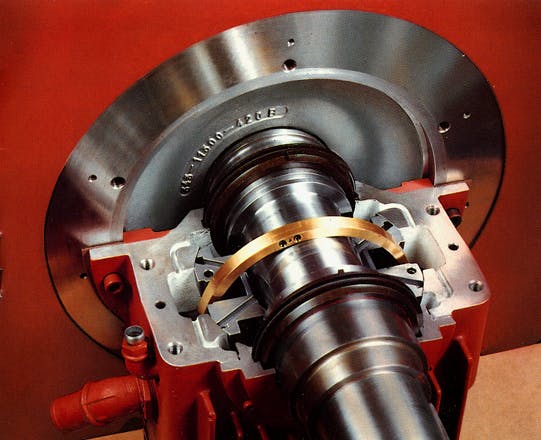 Photo 3. Typical sleeve bearing arrangement, with the top half of the bearing removed for inspection.