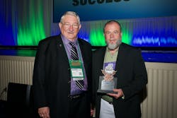 Past EASA Chairman Tim Bieber (left) presents EASA&apos;s 2023 Exceptional Achievement Service Award to Dennis Franklin.
