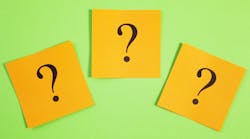 yellow sticky notes with question marks