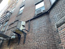 air conditioning installation in an alley air conditioning installation in an alley