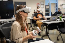 A WECA apprentice explores BESS using a VR headset. A WECA apprentice explores BESS using a VR headset.