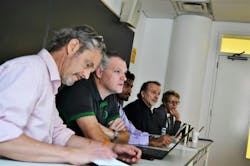 Photo 2. Members of the maintenance staff participate in a wall controls training session. Photo 2. Members of the maintenance staff participate in a wall controls training session.