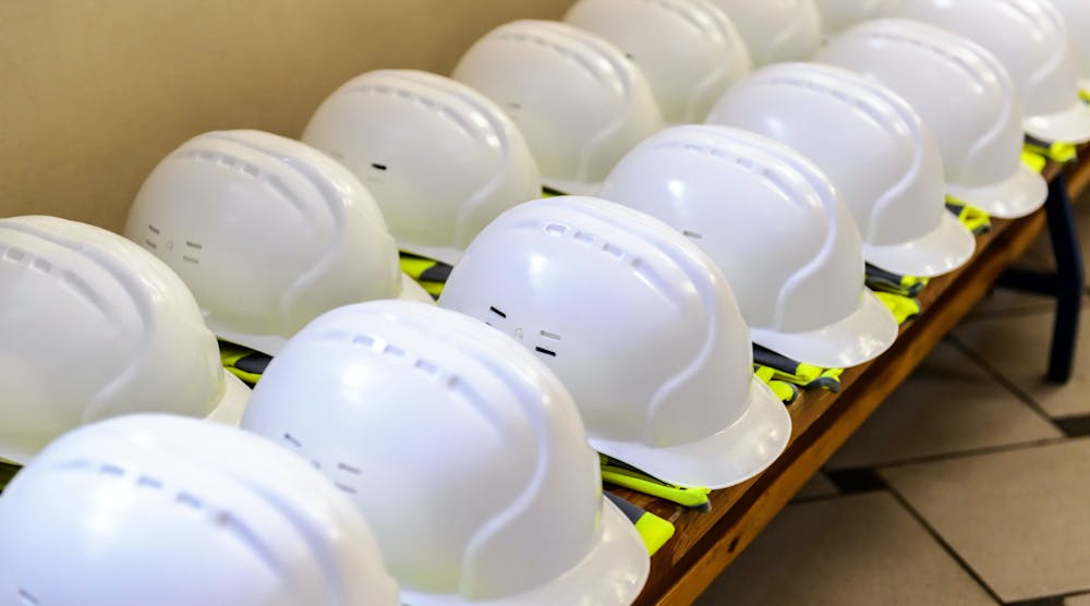 row of construction helmets
