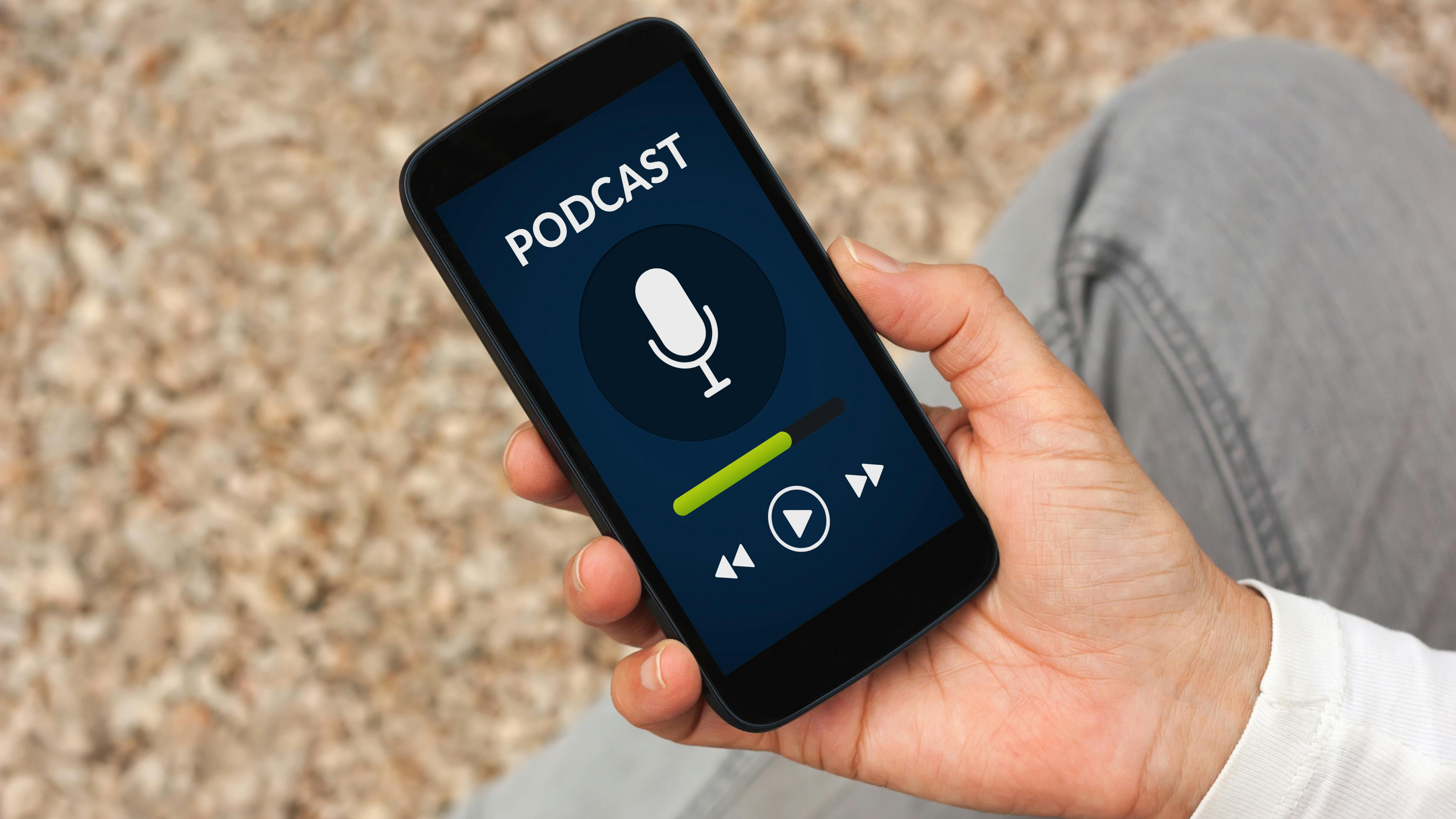 person listening to podcast on phone