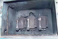 Photo 4. The remains of the PTs in the upper cabinet. Photo 4. The remains of the PTs in the upper cabinet.