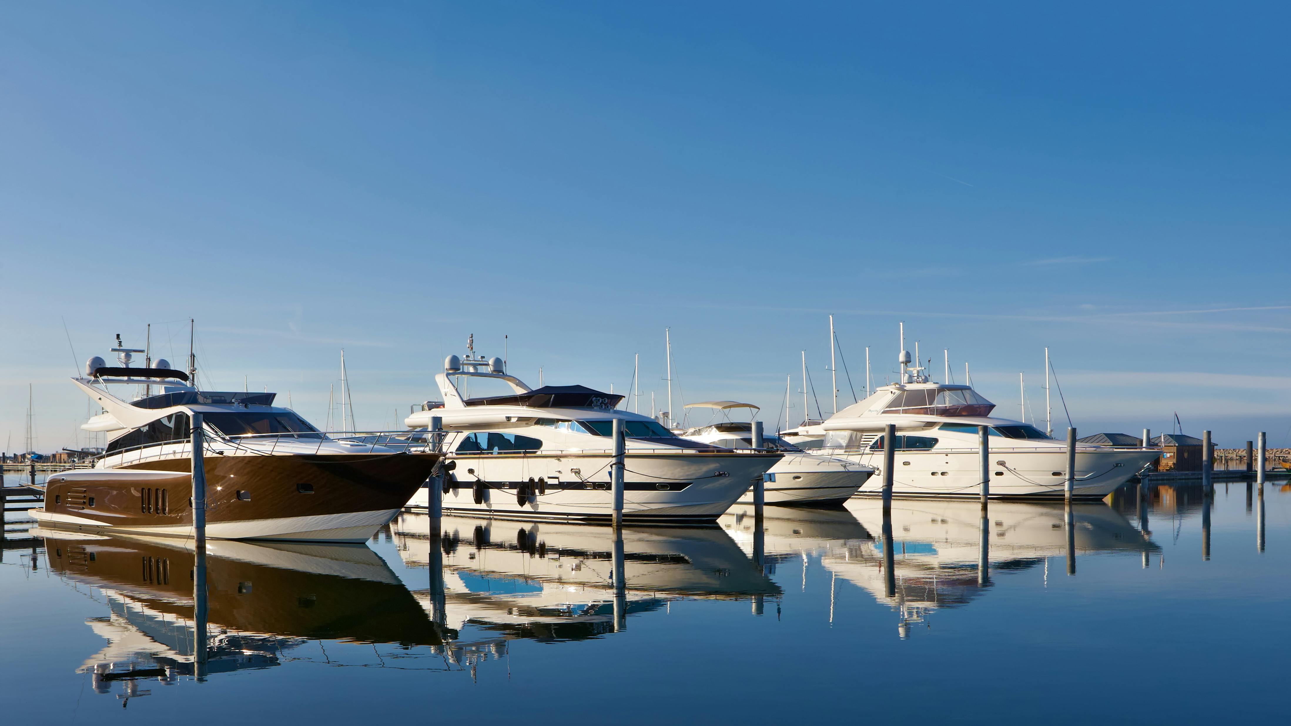 row of yachts in marina