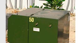 A pad-mount distribution transformer. A pad-mount distribution transformer.