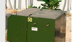 A pad-mount distribution transformer. A pad-mount distribution transformer.