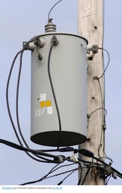 An example of a pole-mounted distribution transformer from the U.S. Department of Energy Office. An example of a pole-mounted distribution transformer from the U.S. Department of Energy Office.