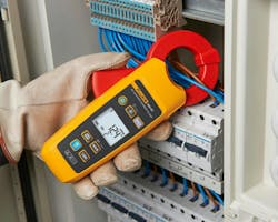 Photo 3. Test for current leaks with a leakage clamp meter to ensure the installation does not exceed maximum acceptable standards. Photo 3. Test for current leaks with a leakage clamp meter to ensure the installation does not exceed maximum acceptable standards.