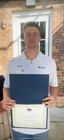 Josh Wilson verifies electrical equipment and checks the blueprints. Josh Wilson verifies electrical equipment and checks the blueprints.