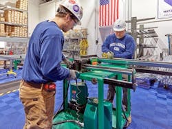 Workers assemble electrical components at a 10,000-sq-ft prefabrication operation in Hamilton, N.J., run by electrical contractor, Hatzel & Buehler, Inc. The firm also utilizes temporary “pop-up” prefab shops that can be built in a week and quickly taken down. Workers assemble electrical components at a 10,000-sq-ft prefabrication operation in Hamilton, N.J., run by electrical contractor, Hatzel & Buehler, Inc. The firm also utilizes temporary “pop-up” prefab shops that can be built in a week and quickly taken down.