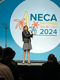 Katie Ledecky shows the NECA audience a gold medal she earned at the 2024 Paris Olympics! Katie Ledecky shows the NECA audience a gold medal she earned at the 2024 Paris Olympics!