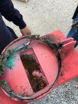 Photo 4. Corona damage on the bus work and insulating boot made identifying this issue easier to spot. Photo 4. Corona damage on the bus work and insulating boot made identifying this issue easier to spot.