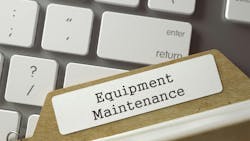 A folder with a tab that says 'Equipment Maintenance' rests on top of a keyboard. A folder with a tab that says 'Equipment Maintenance' rests on top of a keyboard.