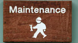 A wooden sign with white writing says 'Maintenance.' Below is a graphic of a construction worker wearing a hard hat and holding a wrench.