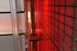 Red lights illuminate as the bookBot springs into action. Red lights illuminate as the bookBot springs into action.