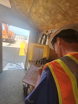 Photo 2. New insulated bucket trucks or digger derricks are first tested by the OEM according to ANSI A92.2-5.3.2 or A10.31 5.3.2 requirements, respectively. Photo 2. New insulated bucket trucks or digger derricks are first tested by the OEM according to ANSI A92.2-5.3.2 or A10.31 5.3.2 requirements, respectively.