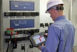 Photo 2. Analog values are injected through a test switch to validate the wiring between a switch and a relay. Photo 2. Analog values are injected through a test switch to validate the wiring between a switch and a relay.