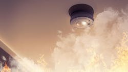 Home safety - smoke detector on ceiling detecting house fire Home safety - smoke detector on ceiling detecting house fire