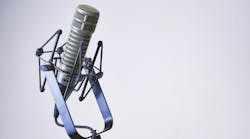 Podcast microphone isolated with a white background. Dynamic podcasting microphone hooked up and ready to record on a clean white background. Podcast microphone isolated with a white background. Dynamic podcasting microphone hooked up and ready to record on a clean white background.