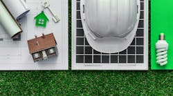 Green building and alternative energies. Sustainable green building and energy saving concept: house project, solar panel and work tools on the grass, top view Green building and alternative energies. Sustainable green building and energy saving concept: house project, solar panel and work tools on the grass, top view