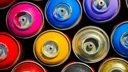 Paint cans. Background of multi-colored containers for paint Paint cans. Background of multi-colored containers for paint