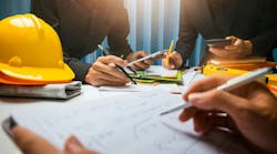 Teamwork of business man contractor working meeting in the office construction site on their architect project. Teamwork of business man contractor working meeting in the office construction site on their architect project.