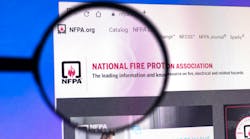 In this photo illustration the homepage of the National Fire Protection Association NFPA magnifying glass. In this photo illustration the homepage of the National Fire Protection Association NFPA magnifying glass.
