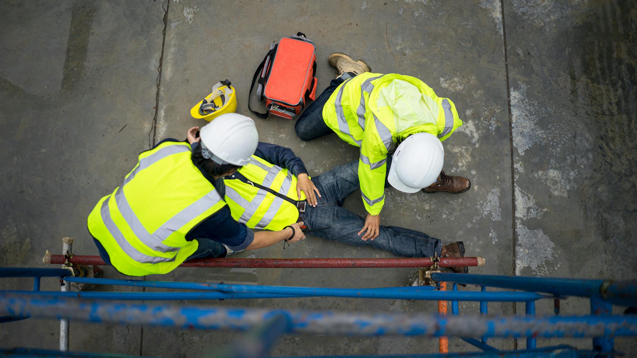 Basic first aid training for support accident in site work, Builder accident fall scaffolding to the floor, Safety team help employee accident.