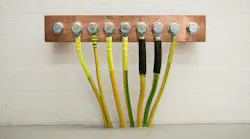 Grounding with cables. Electrical grounding on a copper bar in a it server room Grounding with cables. Electrical grounding on a copper bar in a it server room