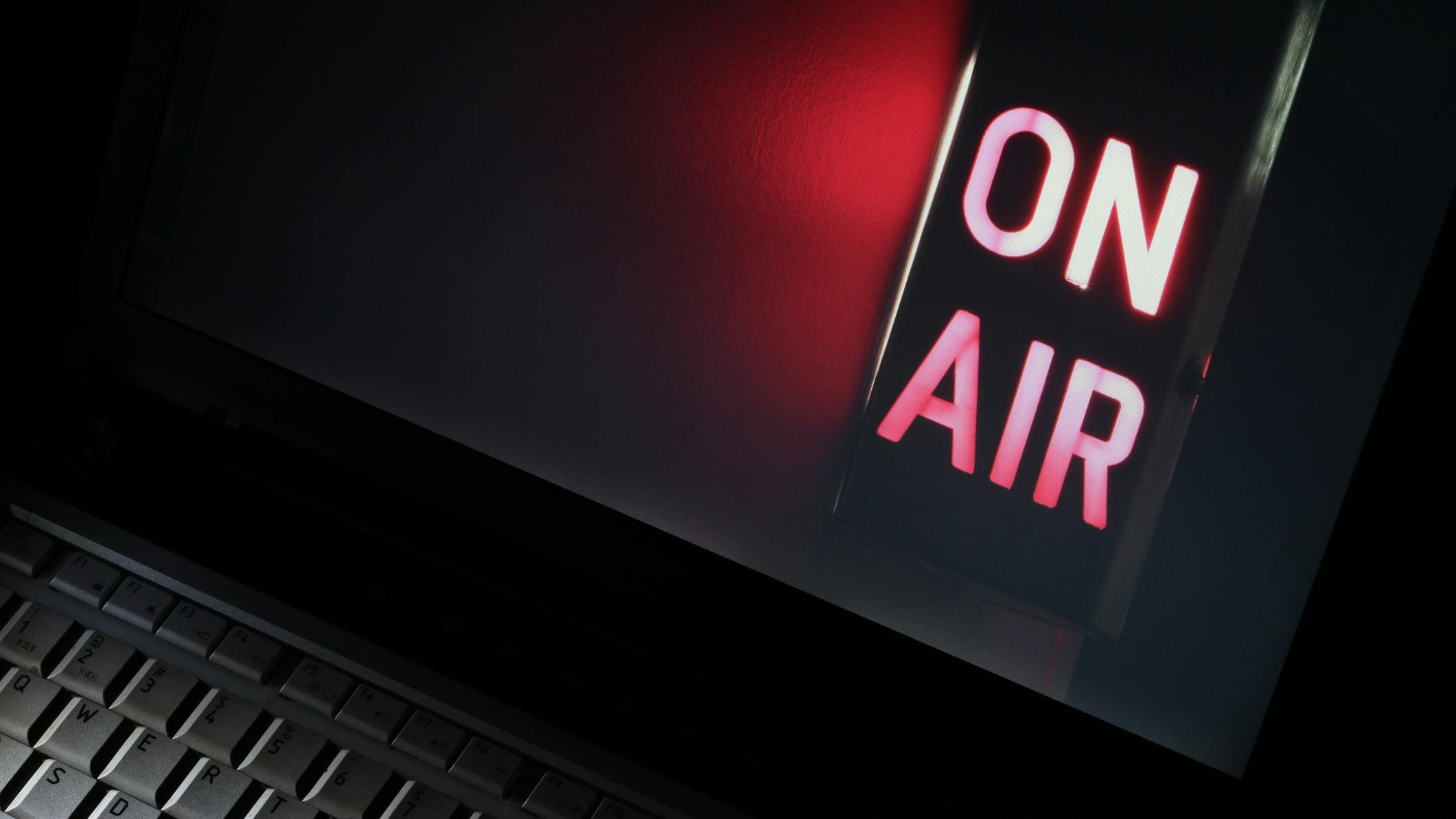 Internet Television. Computer live streaming Television symbolized by iconic On-Air broadcast sign.