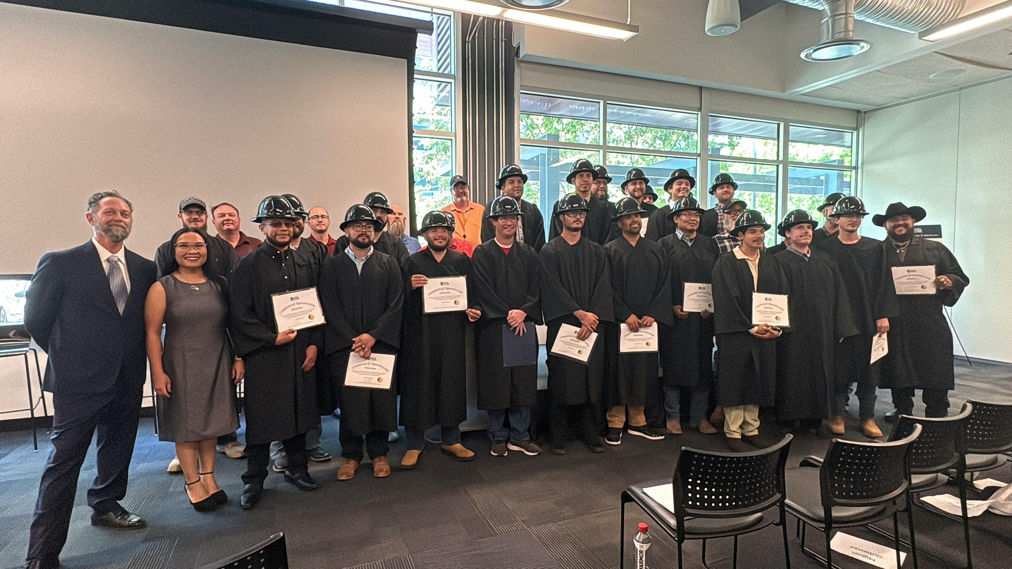 Graduates completed thousands of hours of on-the-job training and classroom instruction.