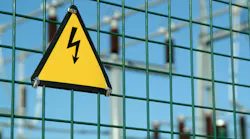 High voltage danger sign in fence of power plant High voltage danger sign in fence of power plant