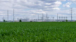 Construction of the 600 MW power facility at a new data center in Hutto Texas shows the rural landscape and sprawling corn fields.