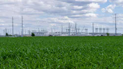 Construction of the 600 MW power facility at a new data center in Hutto Texas shows the rural landscape and sprawling corn fields.