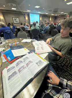 David Hemsworth, an Ulster BOCES Electrical Construction and Maintenance student, asks a question during an Independent Alliance of the Electrical Industry (IAEI) educational meeting in Kingston, New York. Students attended alongside industry professionals, discussing the 2023 National Electrical Code Handbook and reinforcing that success in the electrical profession requires curiosity, mentorship, and a lifelong commitment to learning.