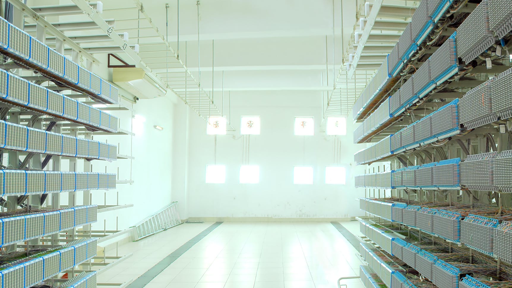 A shot of network cables and servers in a technology data center