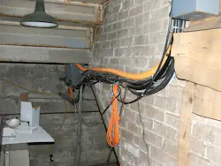 A pig-pile of cables and raceways