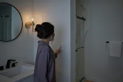 Dimming controls are easy to locate in a dark room and allow lights to gradually rise to a level that’s easy on the eyes. Shown above: Diva dimmer with Night Mode.