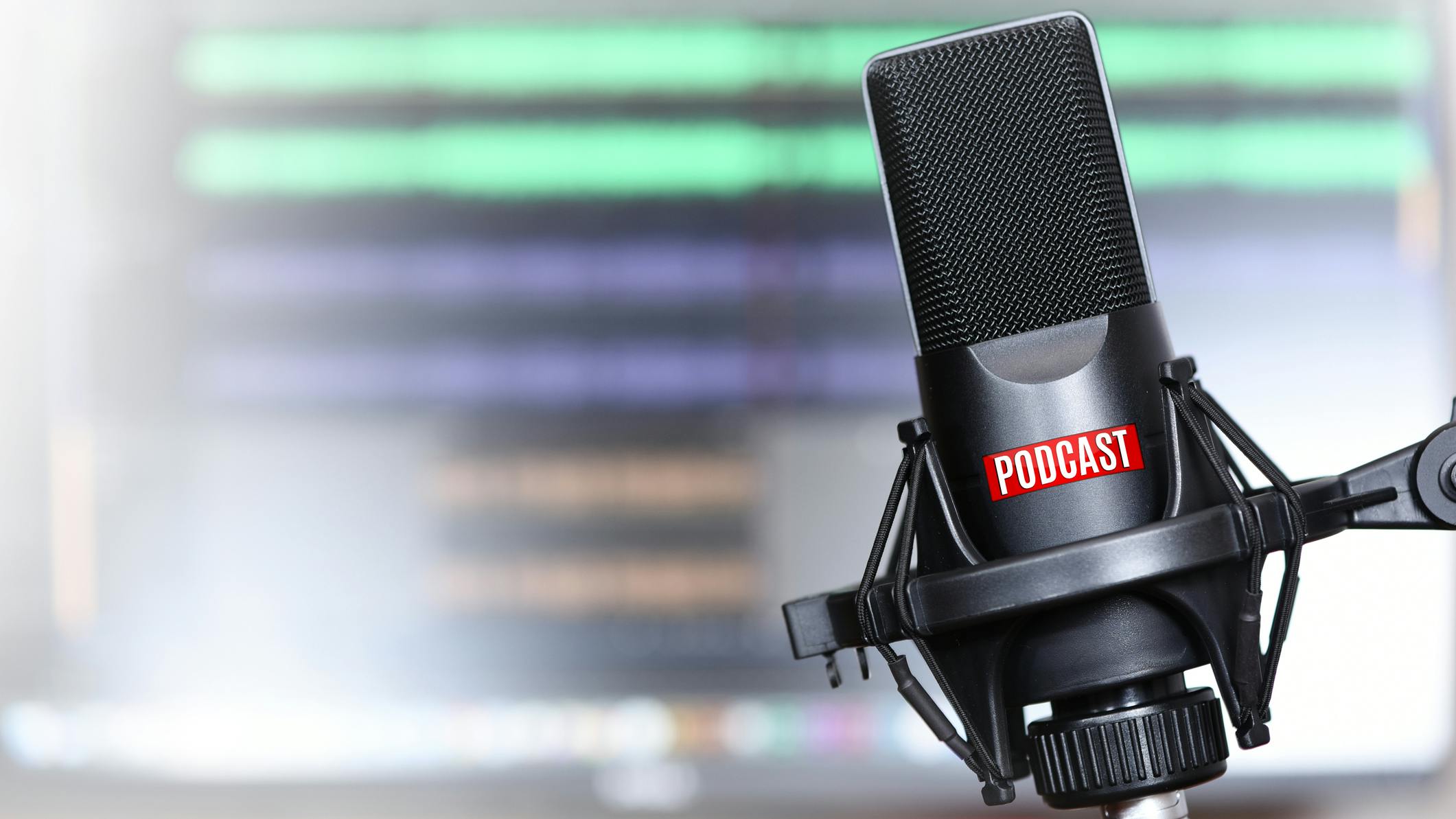Studio microphone with a podcast icon close up