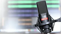 Studio microphone with a podcast icon close up